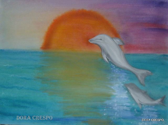 Delfines con el sol